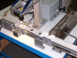 Backlit conveyor system with vision system.