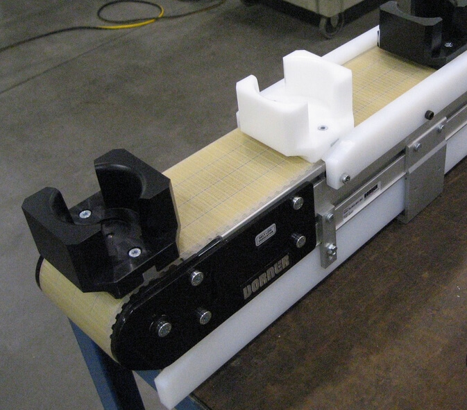 Precision positioning conveyor belt systems AS Conveyor Systems